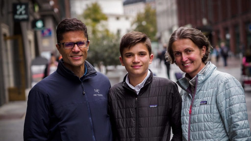 Carr family - Sean, Sebastian and Ladi are smiling at the camera, in the background part of the Stockmann building can be seen, 90 Day Finn family