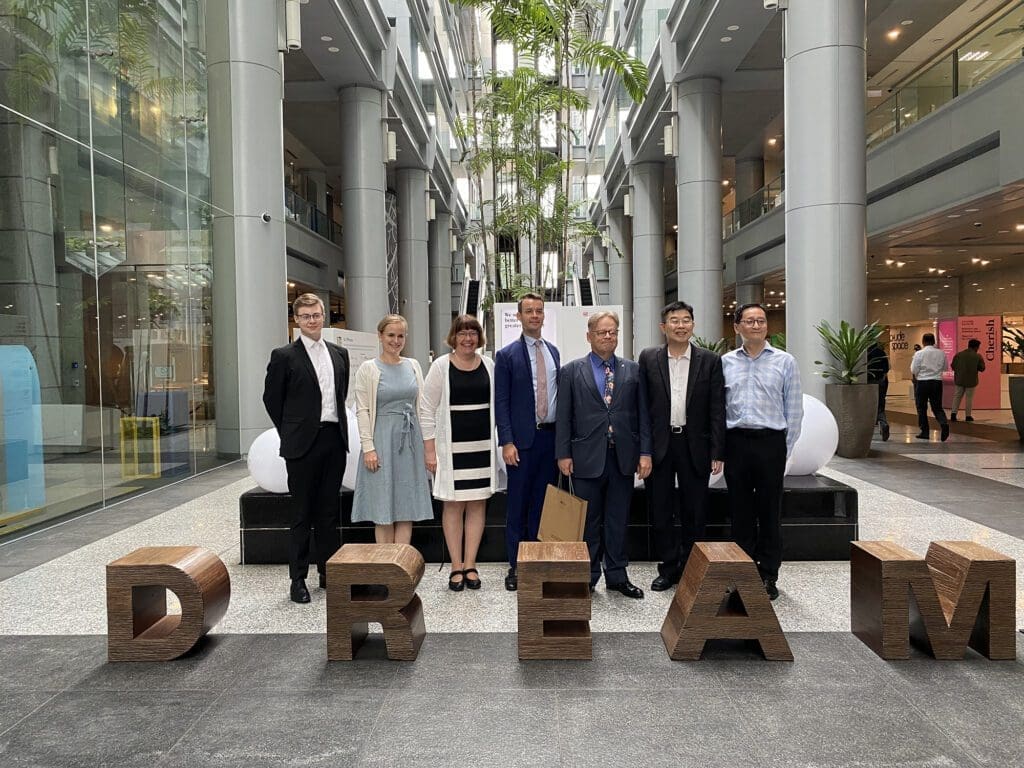 A group photo of the representatives from the City of Helsinki, Helsinki Partners, and Housing Development Board.