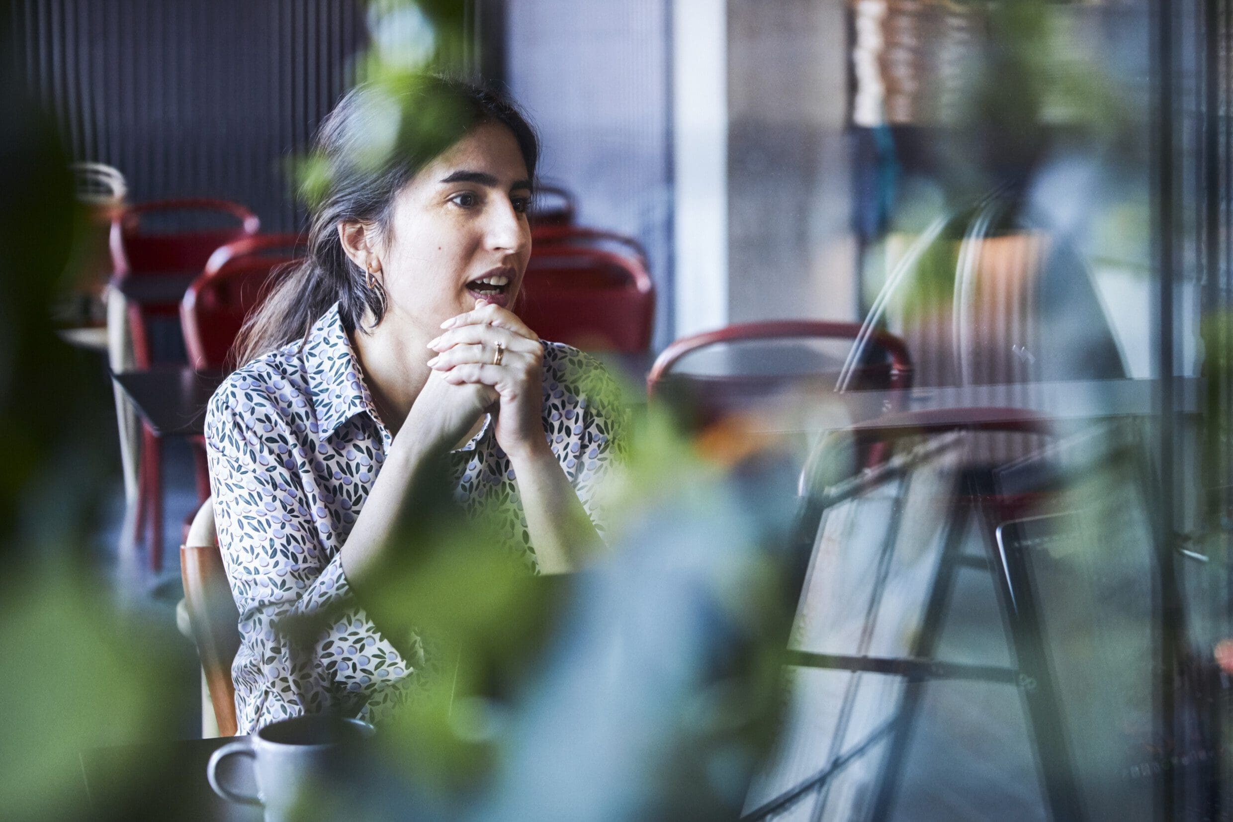 Woman talking behind the window