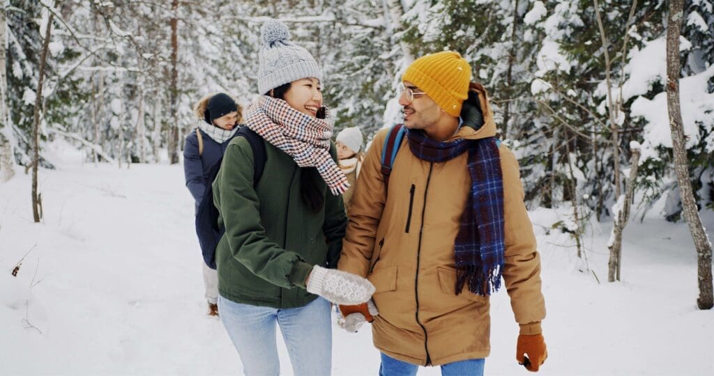 Diverse group in a snowy forest