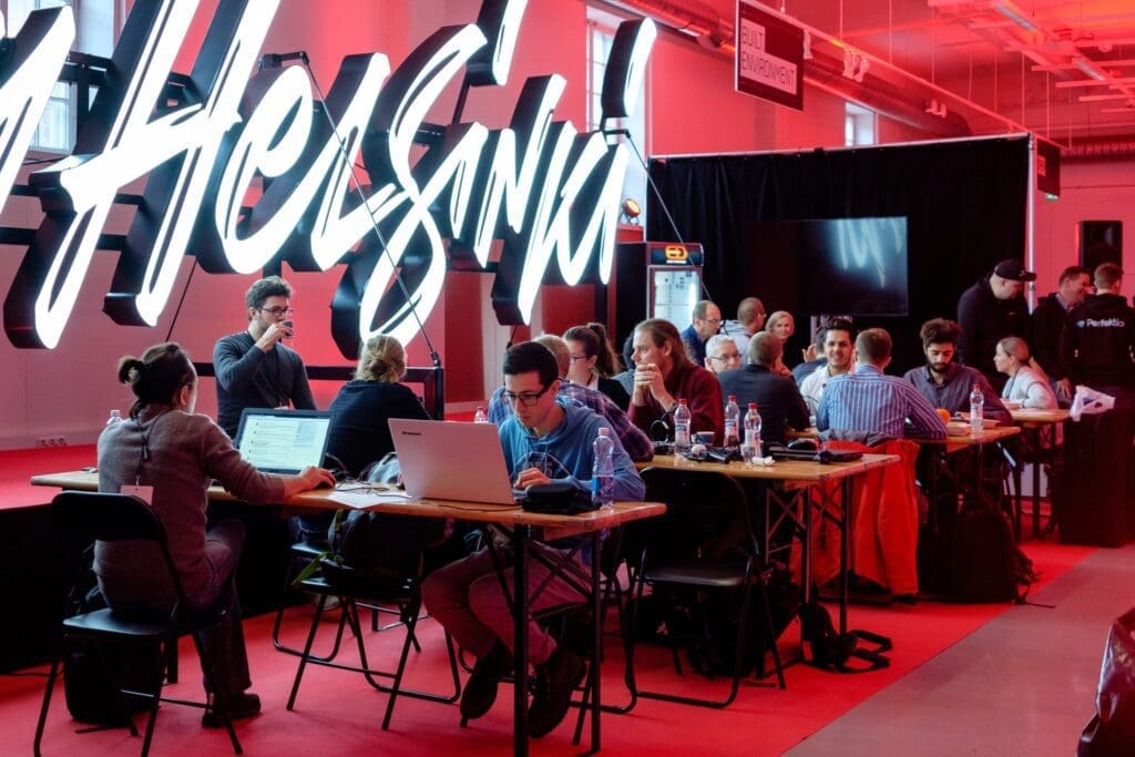 People working on their laptops at a hackaton