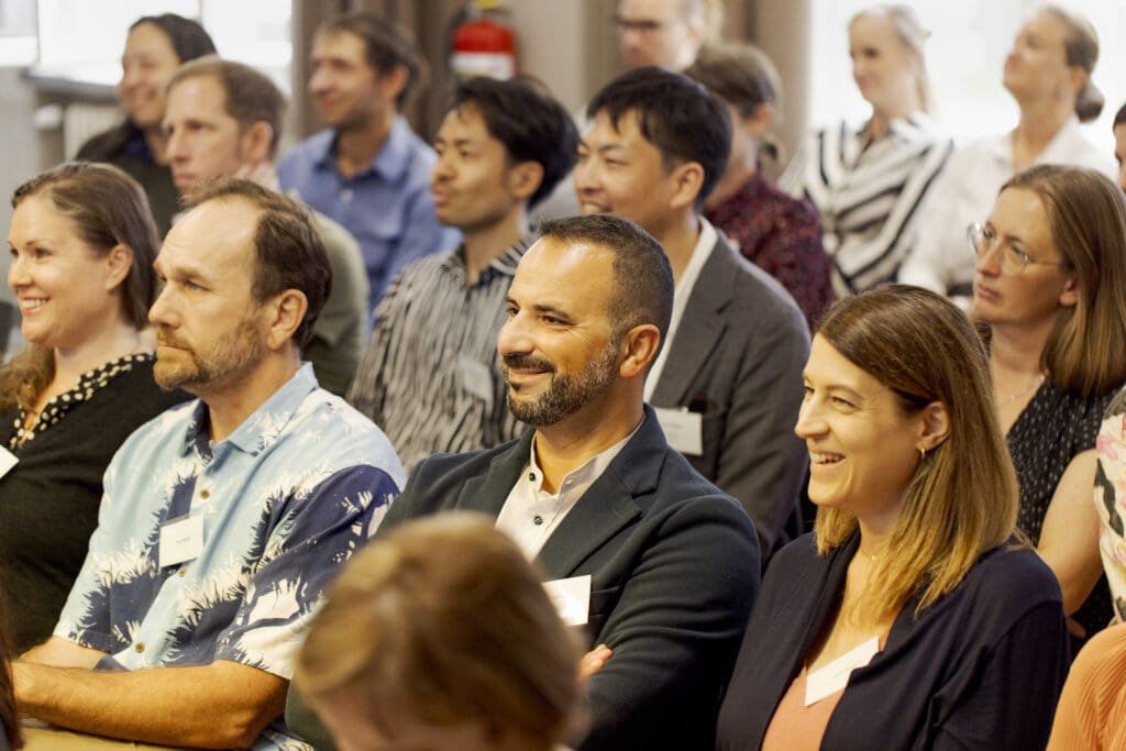 Audience listening attentively to a speech