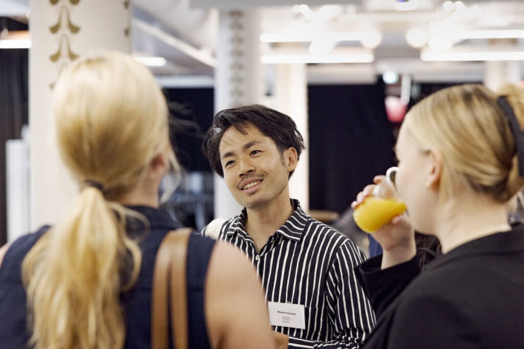 People chatting in a networking event