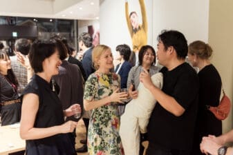 Helsinki Partners' Business Advisor networking with guests at an event in Japan